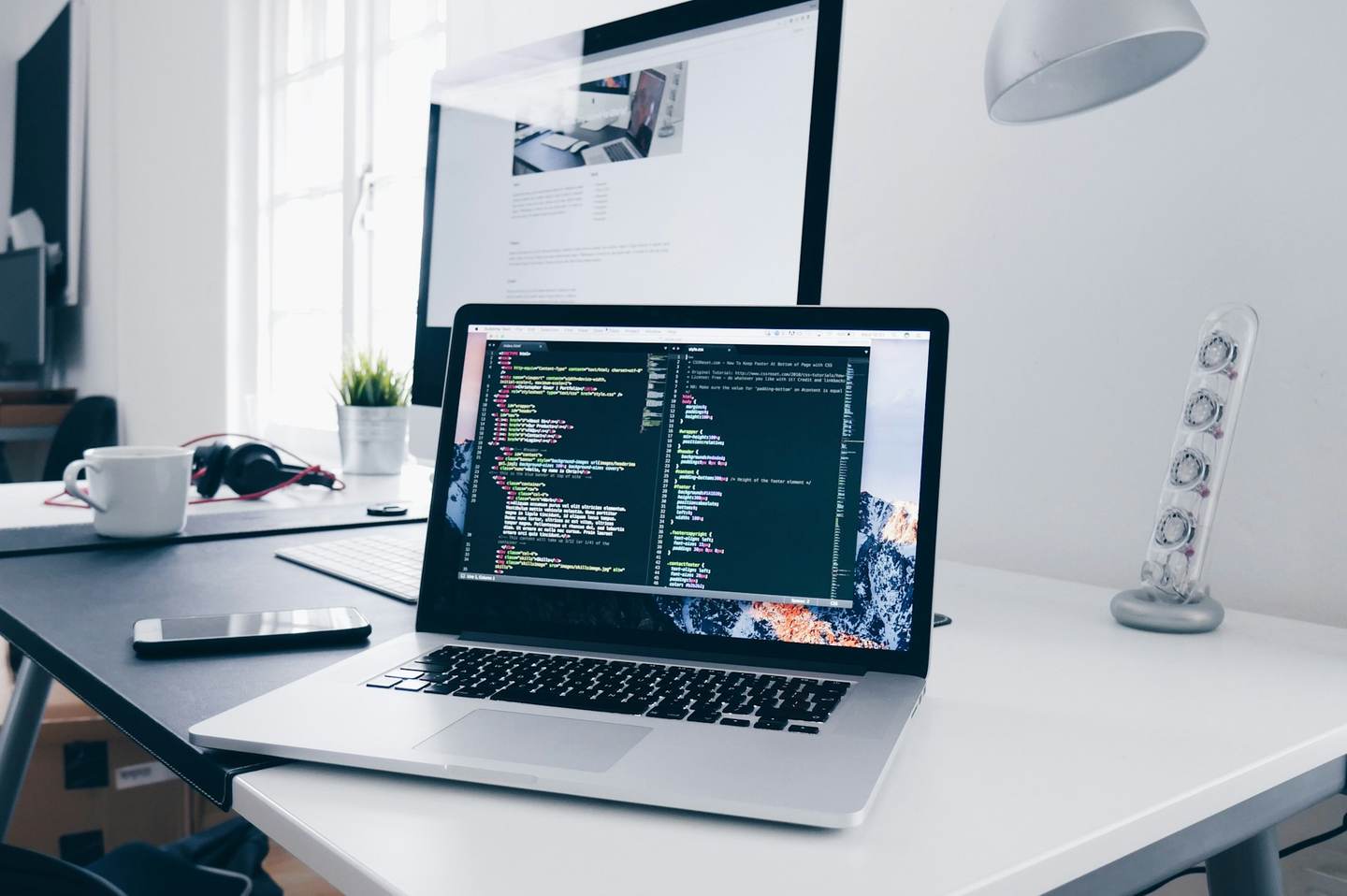 Desk workspace photo compressed below a 100KB target